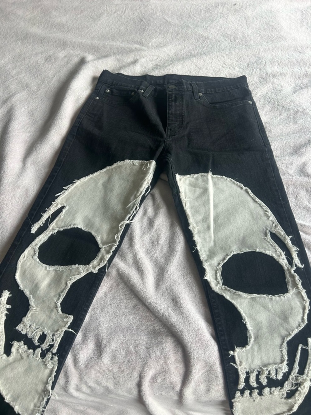 Men's Black Jeans with Distressed White Skull Panels